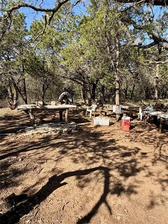 a view of a backyard of a house