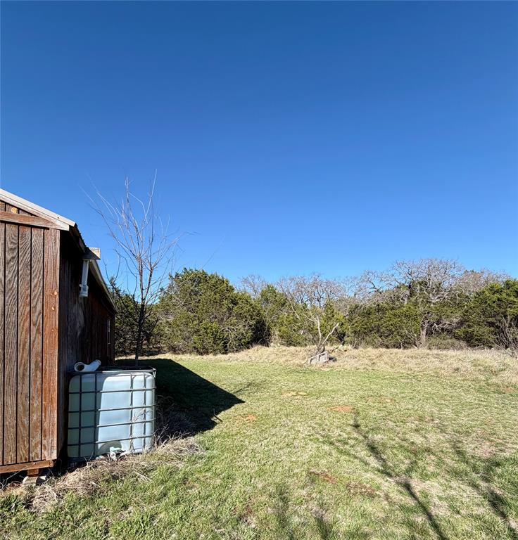 640 M24 Road Ranger, TX 76470 - Photo 22 of 26 a view of a yard with wooden fence