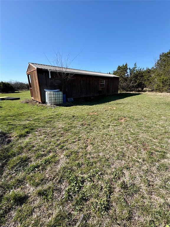640 M24 Road Ranger, TX 76470 - Photo 23 of 26 a front view of a house with a yard