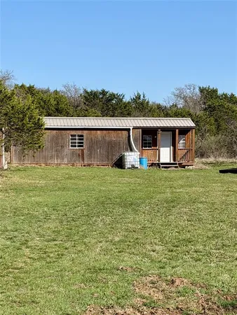 a house view with a garden space