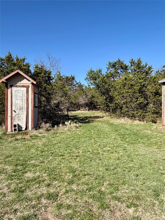 640 M24 Road Ranger, TX 76470 - Photo 10 of 26 a front view of a house with a yard