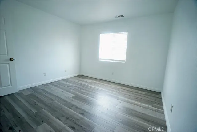 a view of a backyard of the house