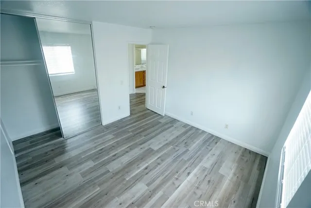 a view of a yard with a large tree