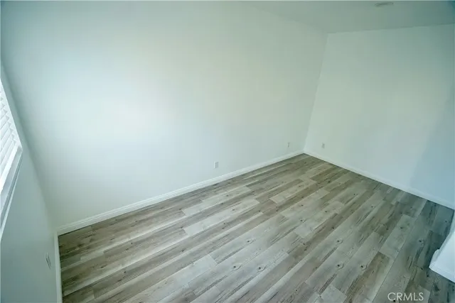 a kitchen with cabinets and stainless steel appliances