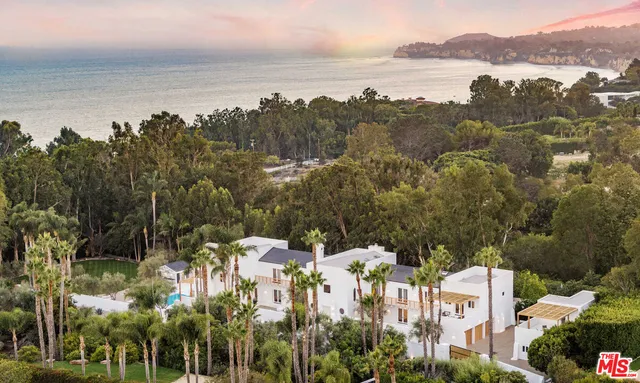 a view of a lake with a mountain in the background