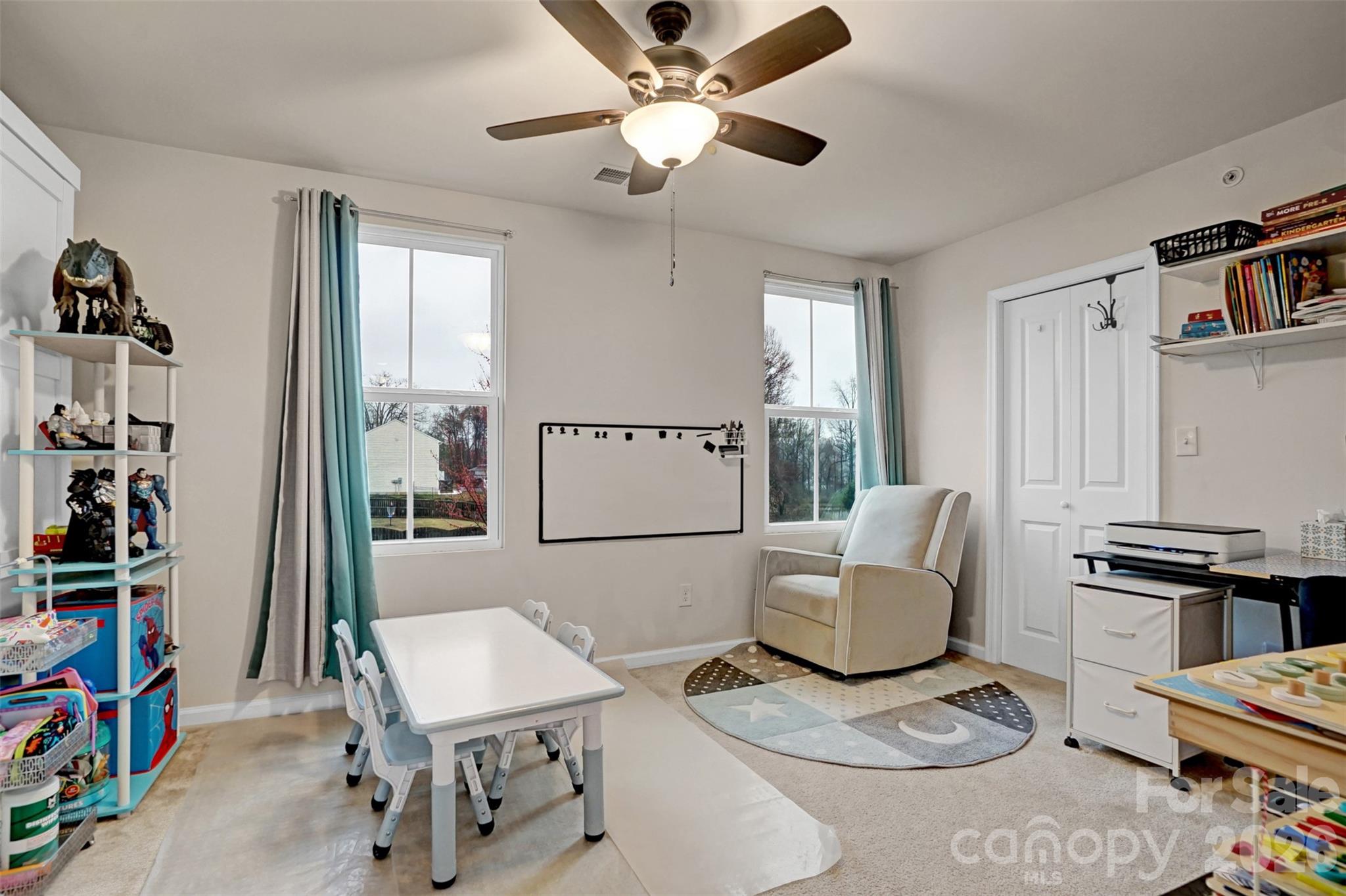 1144 Tangle Ridge Drive Southeast Concord, NC 28025 - Photo 20 of 27 a living room with furniture and a window