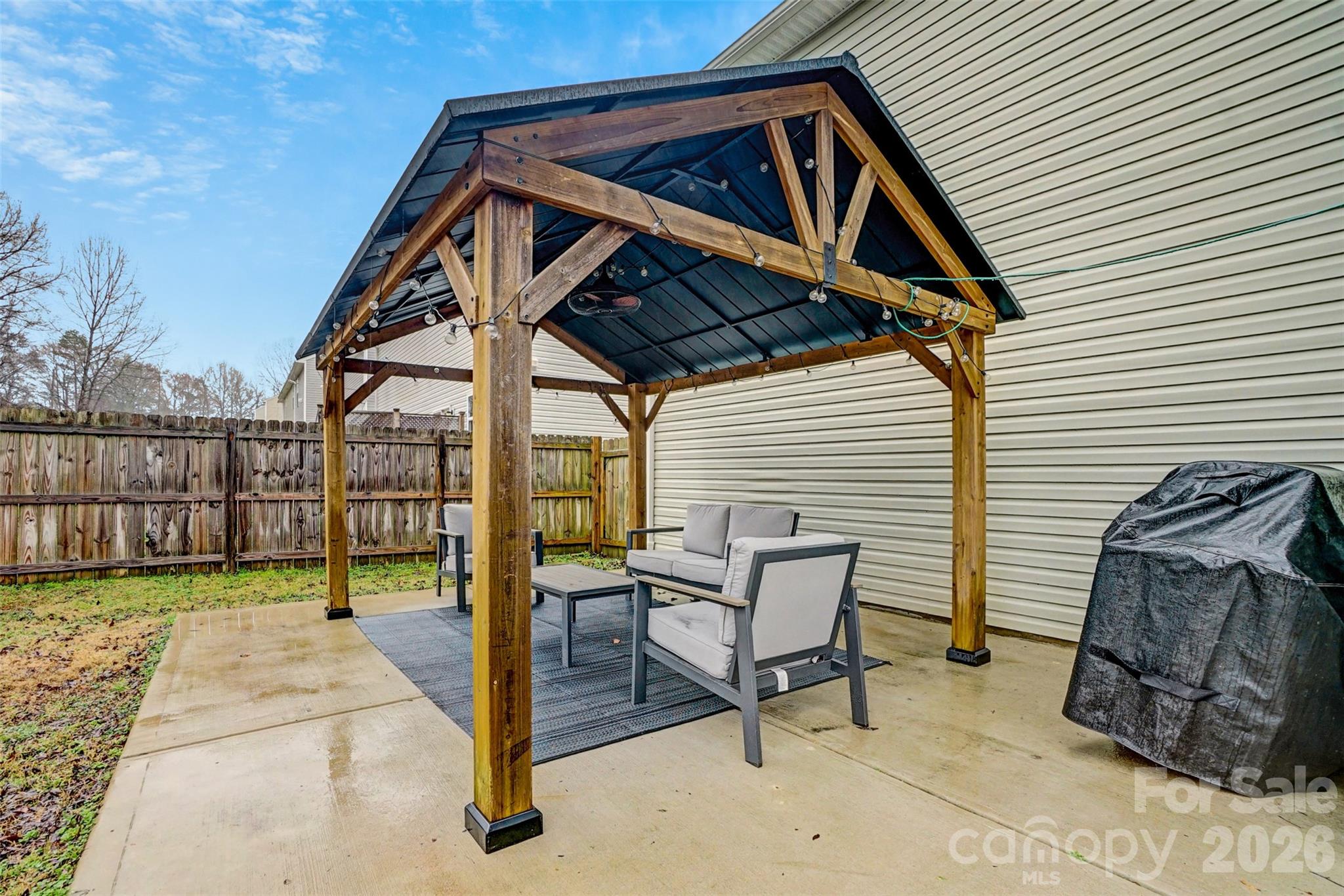 1144 Tangle Ridge Drive Southeast Concord, NC 28025 - Photo 23 of 27 a view of outdoor space with seating