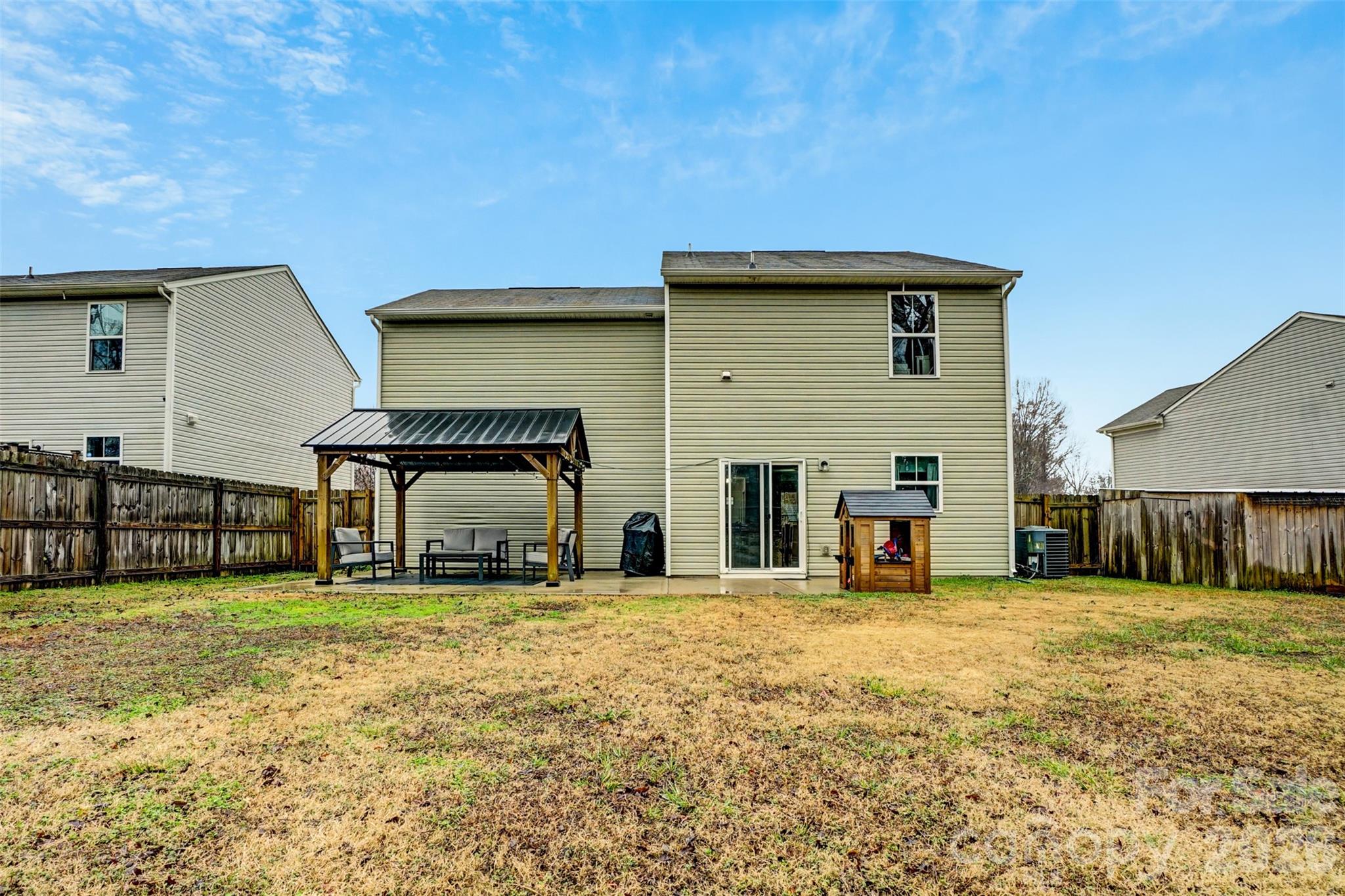 1144 Tangle Ridge Drive Southeast Concord, NC 28025 - Photo 24 of 27 a view of a house with a yard