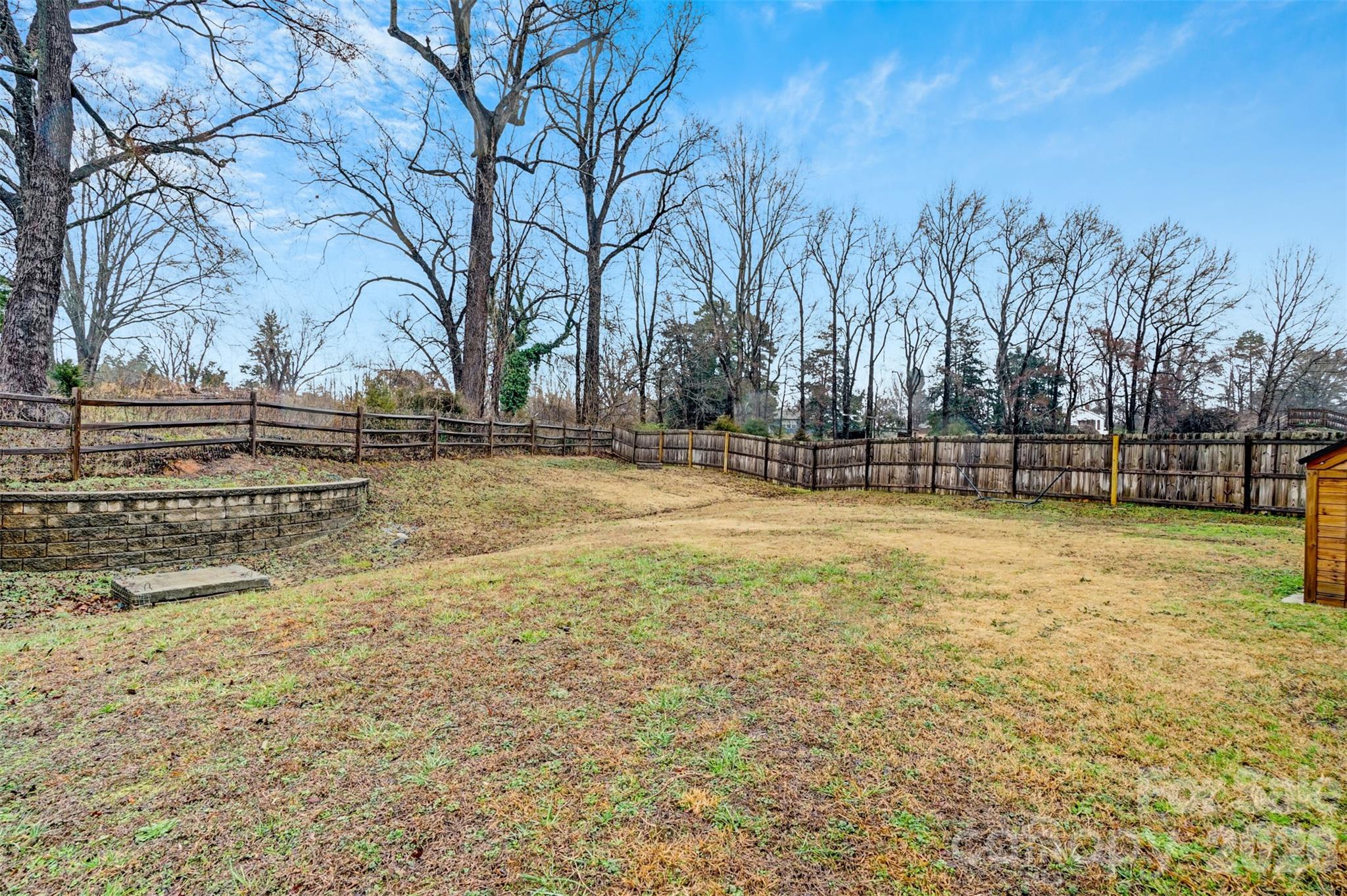 1144 Tangle Ridge Drive Southeast Concord, NC 28025 - Photo 27 of 27 a view of yard with trees