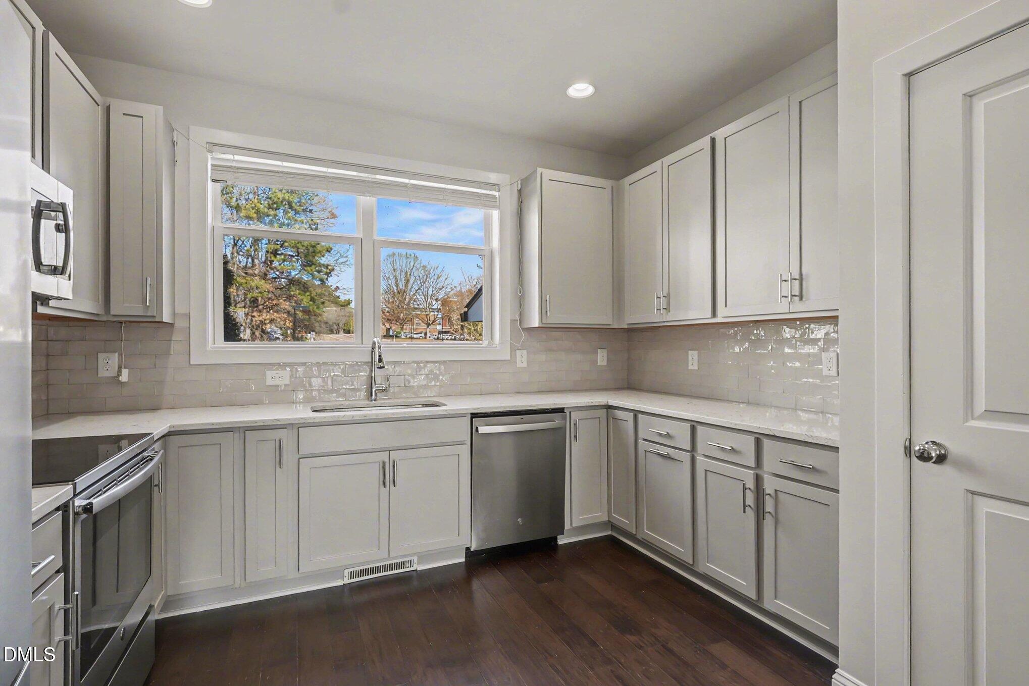 1211 Capability Drive, Unit 102 Raleigh, NC 27606 - Photo 5 of 36 020_file_4010