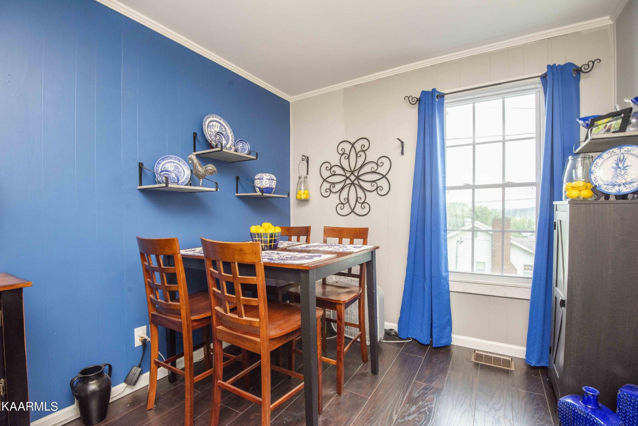 425 Clifton Road Northwest Knoxville, TN 37921 - Photo 11 of 38 a view of a dining room with furniture window and wooden floor
