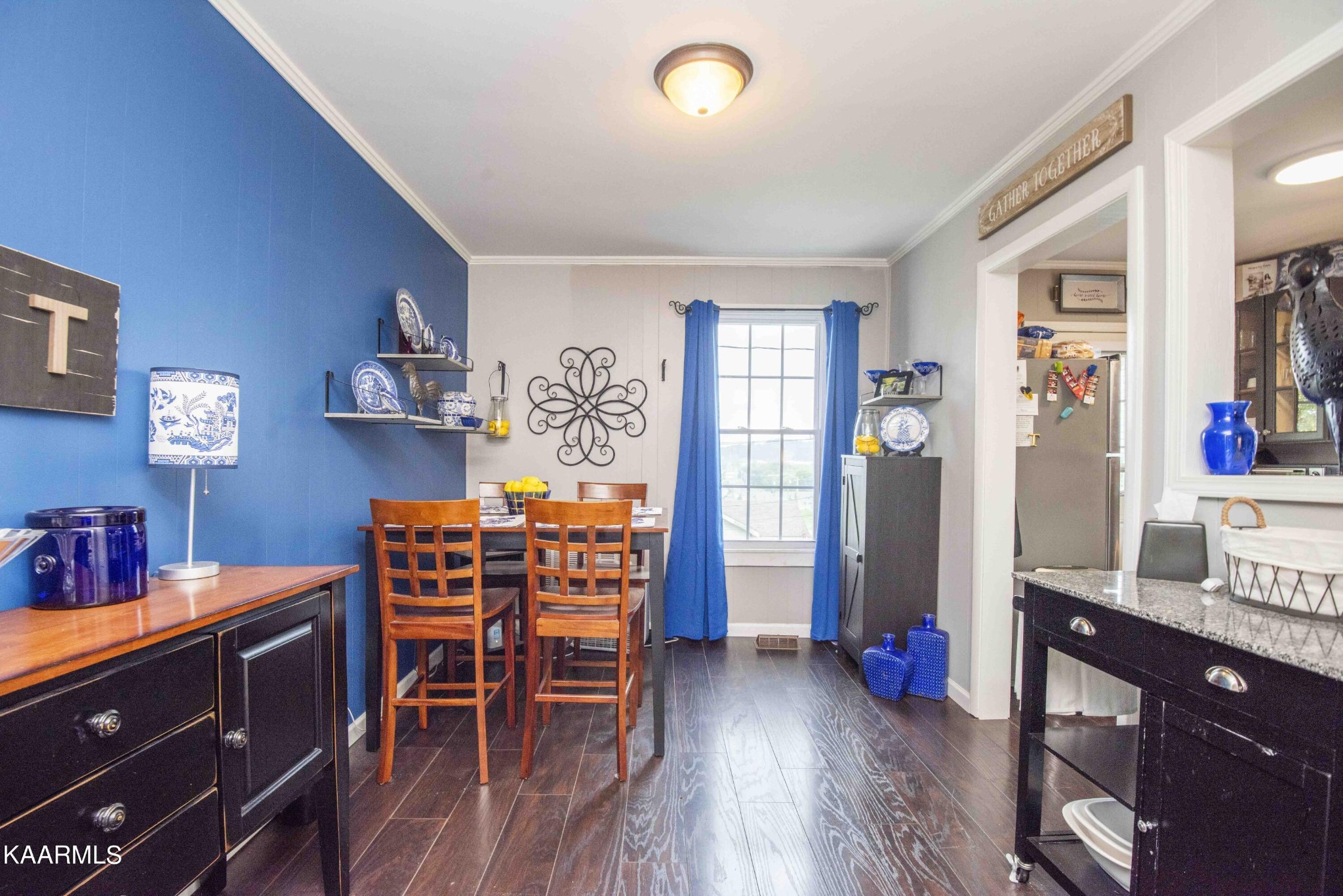 425 Clifton Road Northwest Knoxville, TN 37921 - Photo 12 of 38 a dining room with furniture and wooden floor