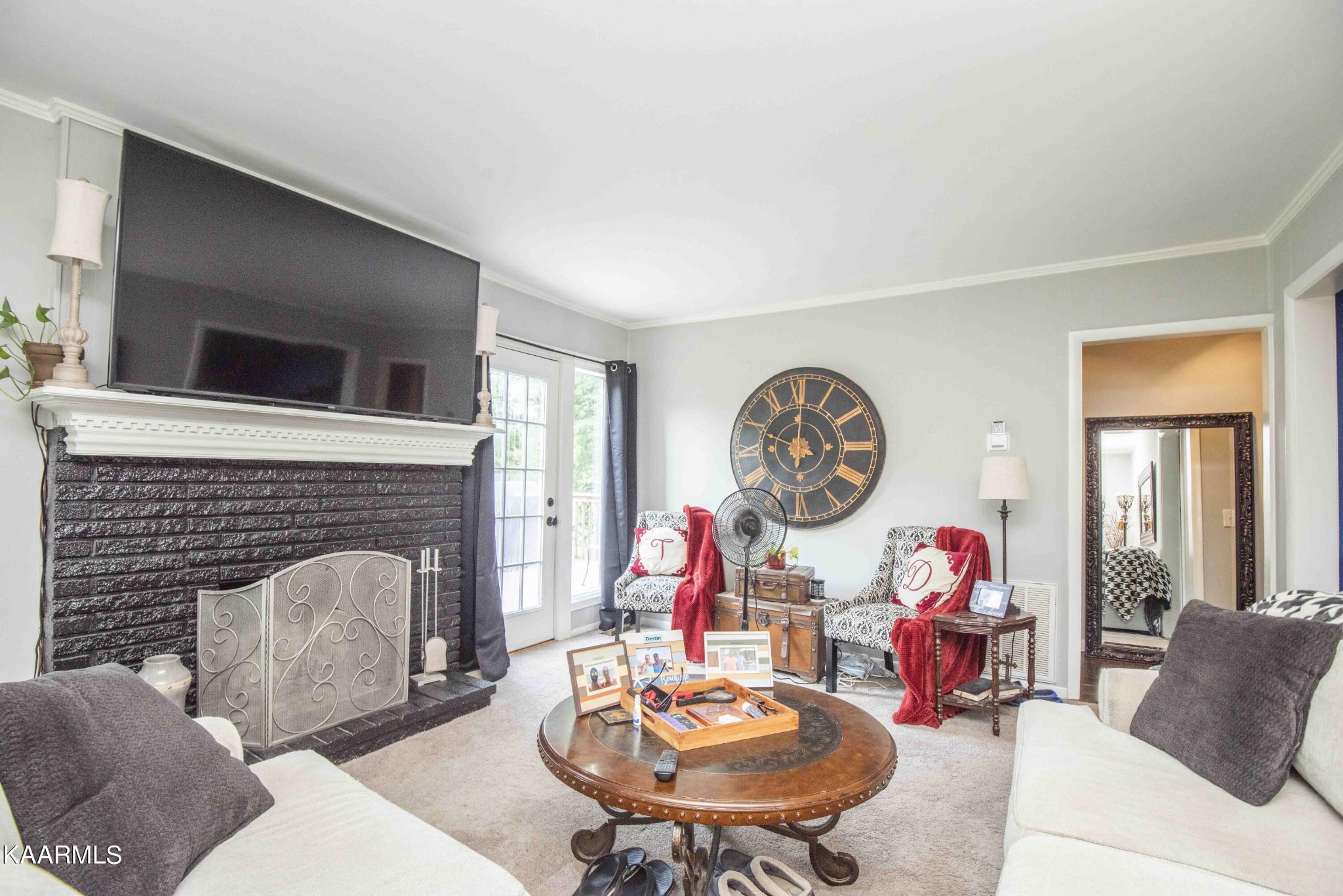 425 Clifton Road Northwest Knoxville, TN 37921 - Photo 2 of 38 a living room with fireplace furniture and a fireplace