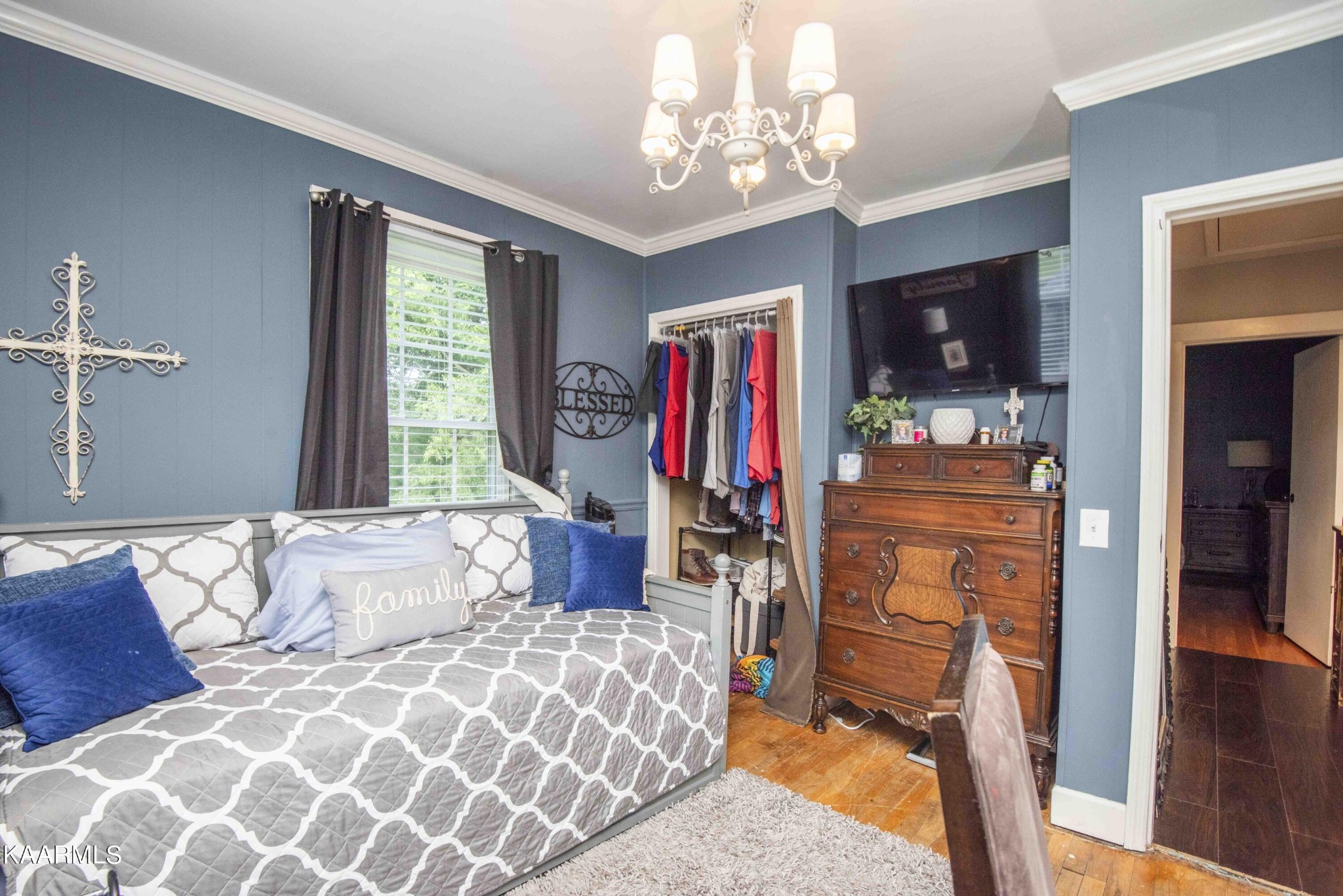 425 Clifton Road Northwest Knoxville, TN 37921 - Photo 21 of 38 a bedroom with a bed dresser and a window