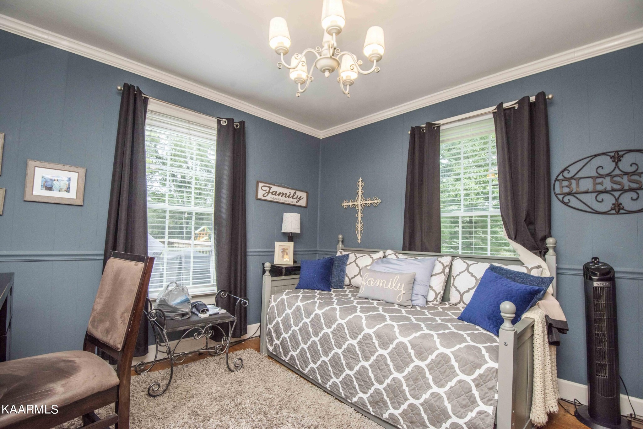 425 Clifton Road Northwest Knoxville, TN 37921 - Photo 22 of 38 a bedroom with furniture and a large window