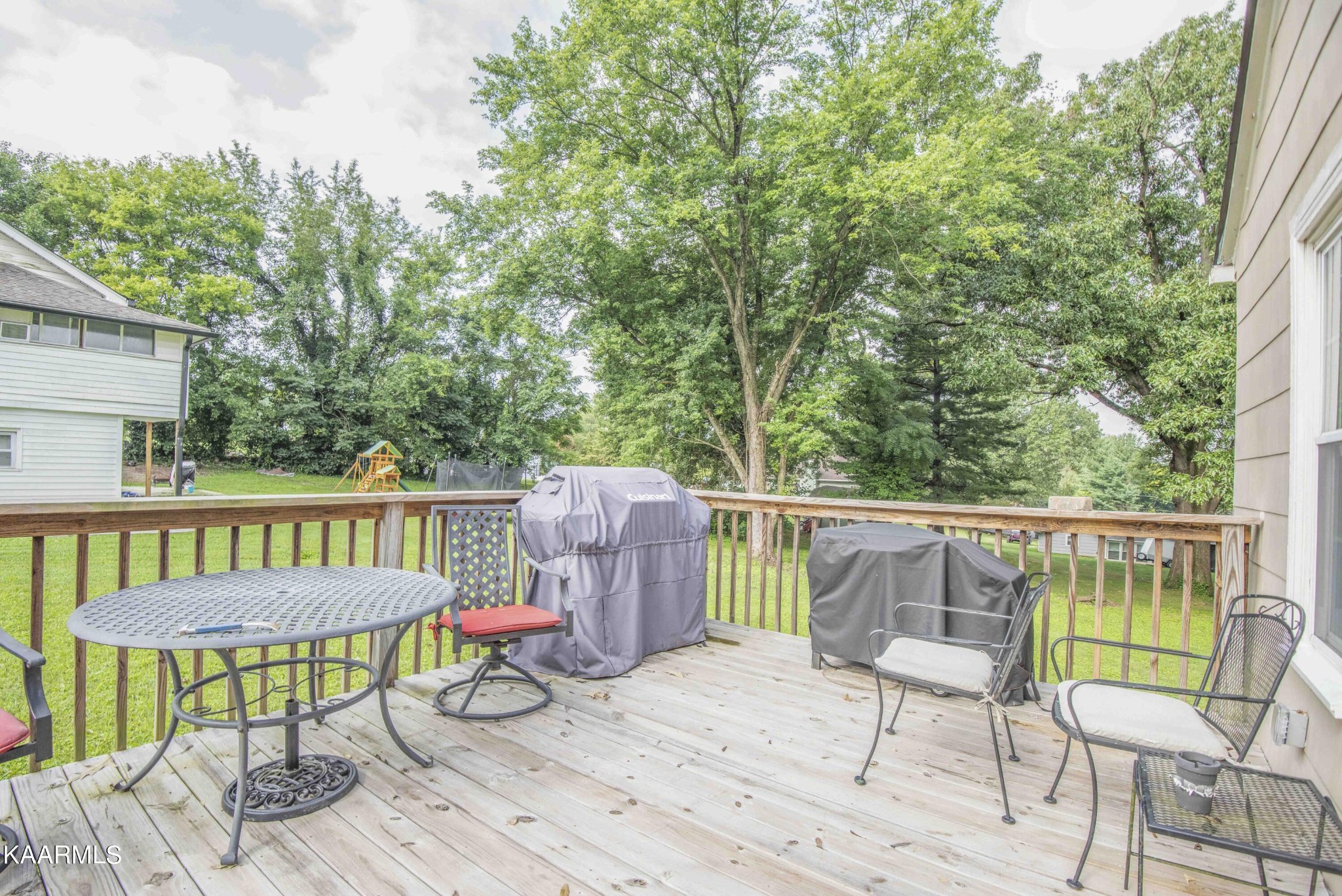425 Clifton Road Northwest Knoxville, TN 37921 - Photo 25 of 38 a view of a chairs and table on the deck