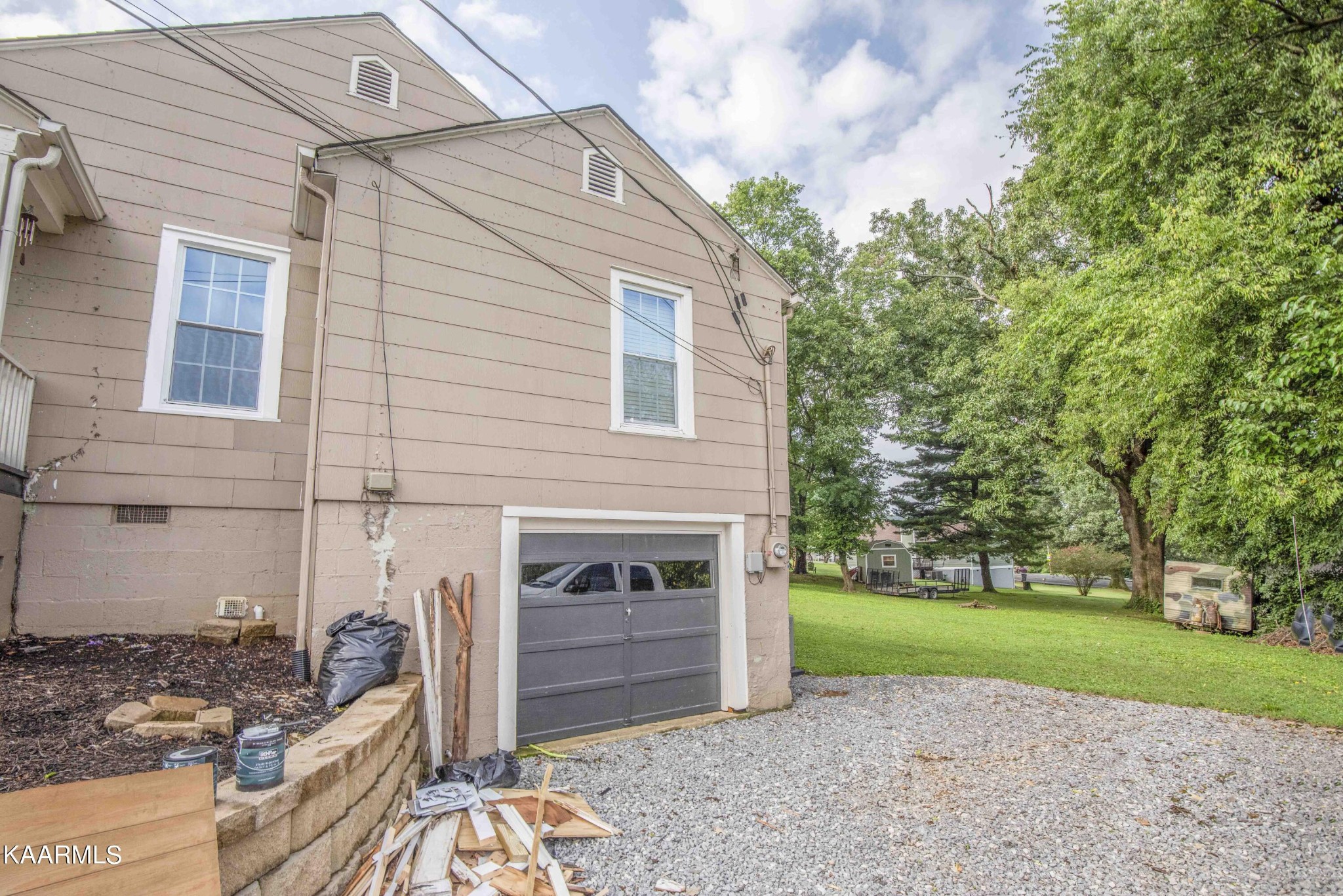 425 Clifton Road Northwest Knoxville, TN 37921 - Photo 30 of 38 a front view of a house with garden