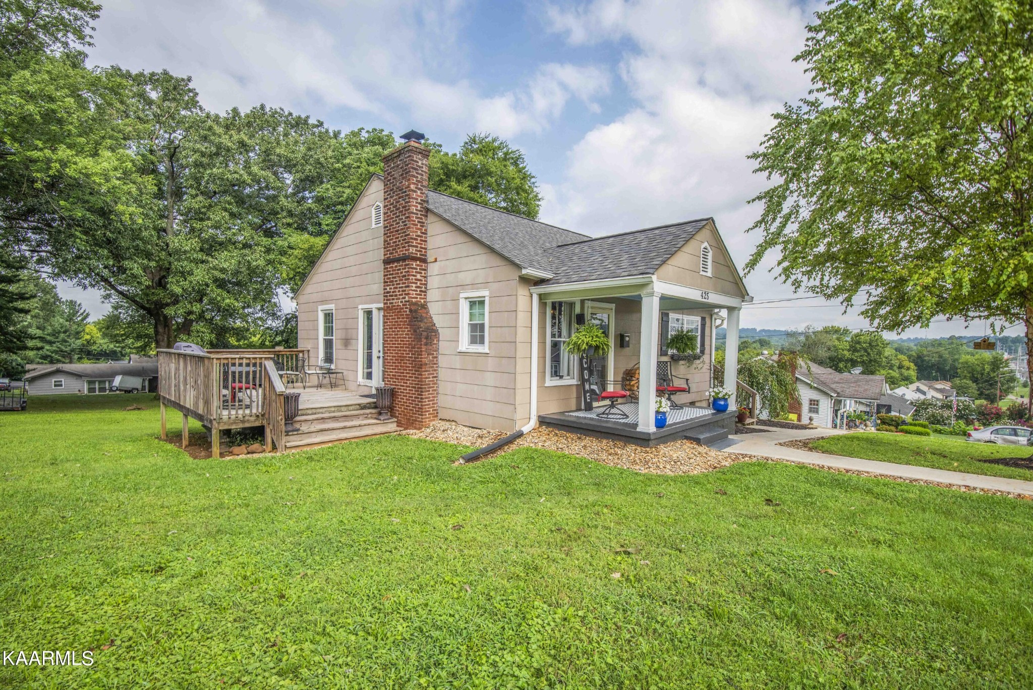 425 Clifton Road Northwest Knoxville, TN 37921 - Photo 31 of 38 a view of a house with a yard and sitting area