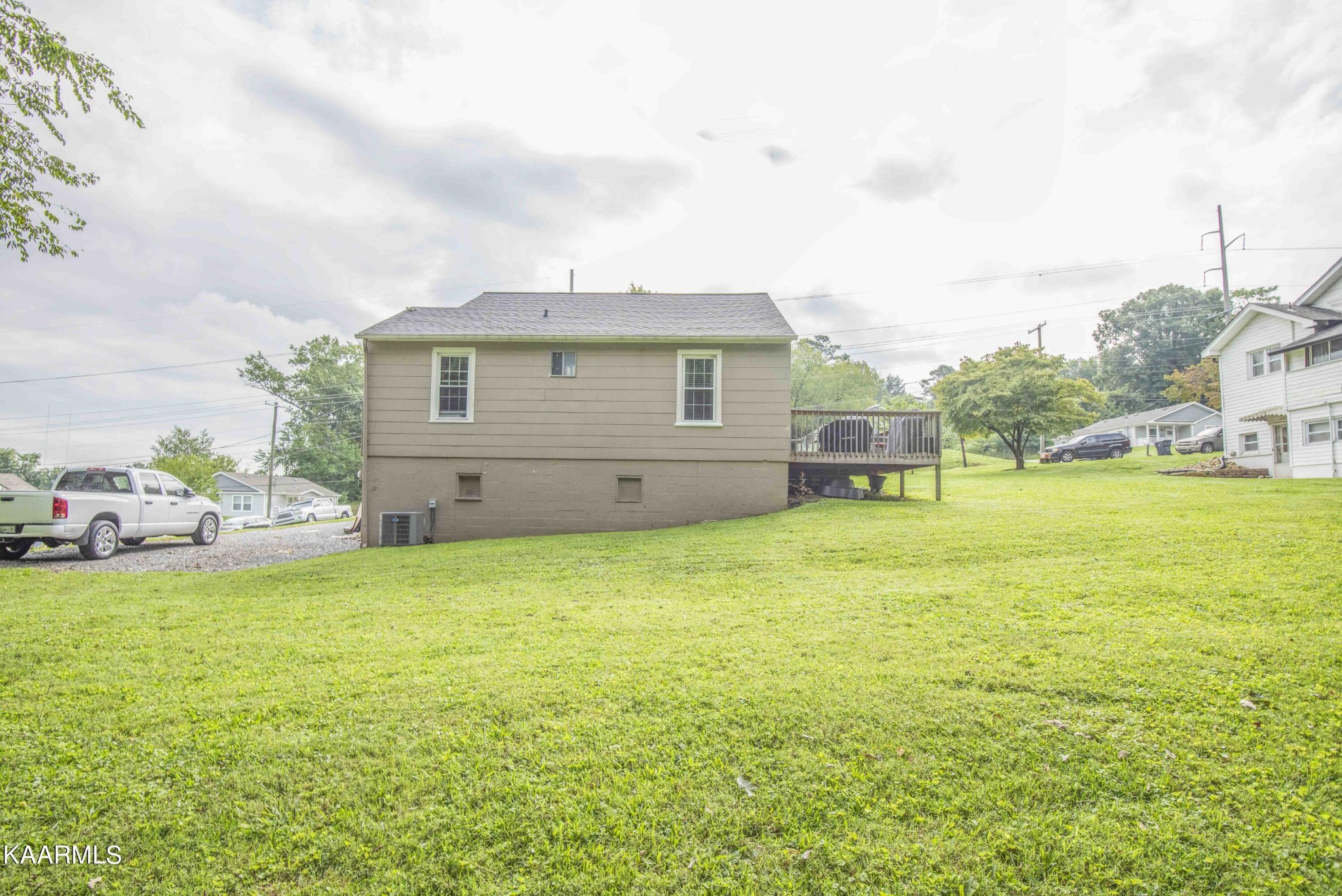 425 Clifton Road Northwest Knoxville, TN 37921 - Photo 34 of 38 a view of a house with a yard and garage