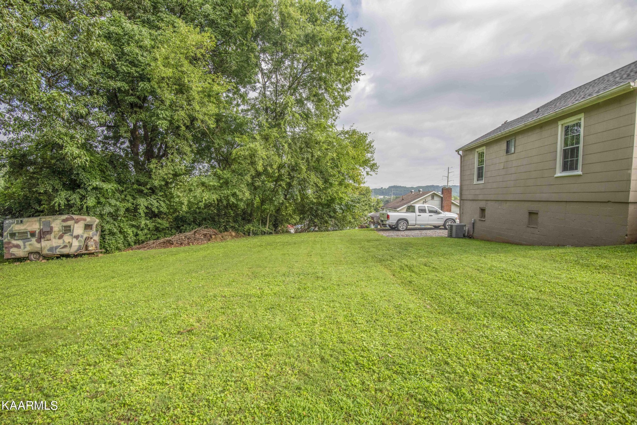 425 Clifton Road Northwest Knoxville, TN 37921 - Photo 35 of 38 a view of a yard with a house