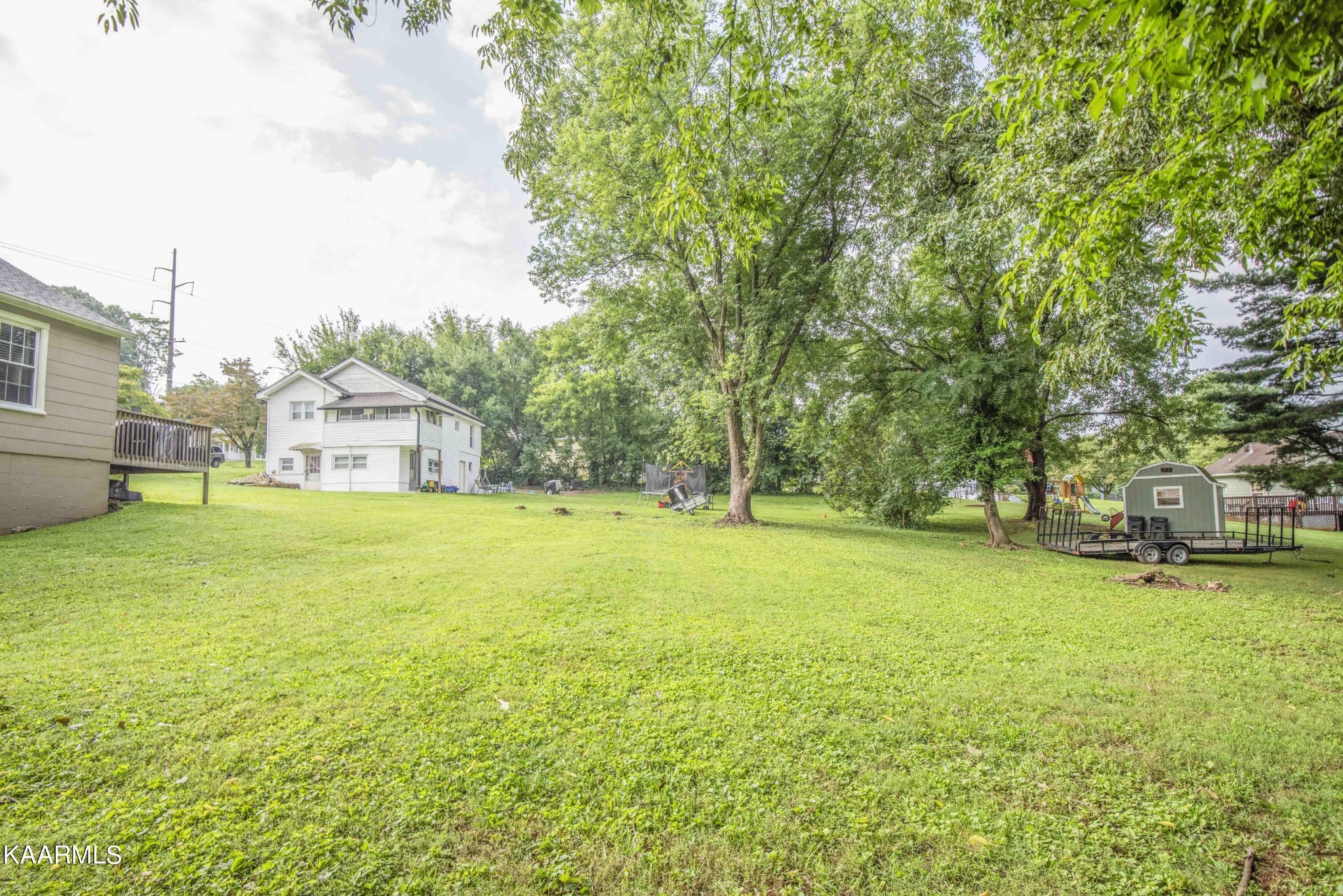 425 Clifton Road Northwest Knoxville, TN 37921 - Photo 38 of 38 a house view with swimming pool in front of it