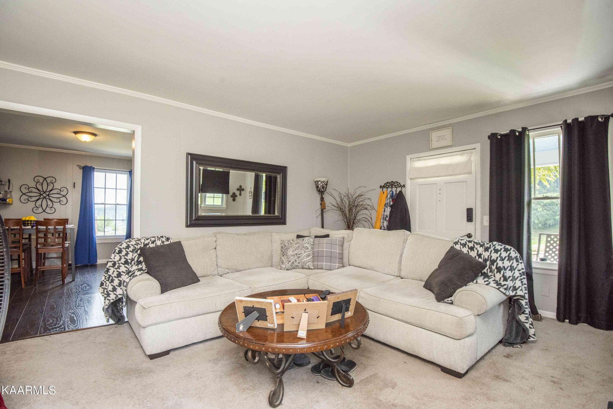 425 Clifton Road Northwest Knoxville, TN 37921 - Photo 8 of 38 a living room with furniture and a large window