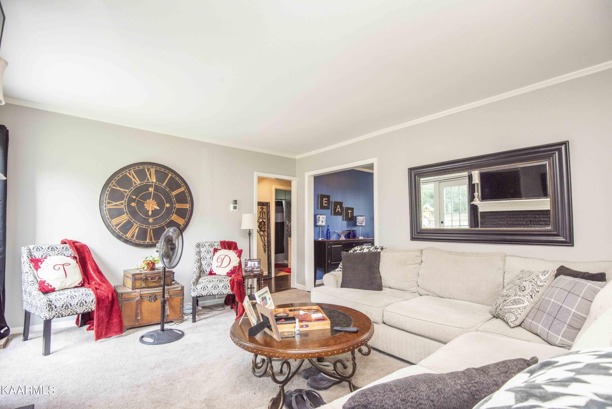 425 Clifton Road Northwest Knoxville, TN 37921 - Photo 9 of 38 a living room with furniture a table and decor