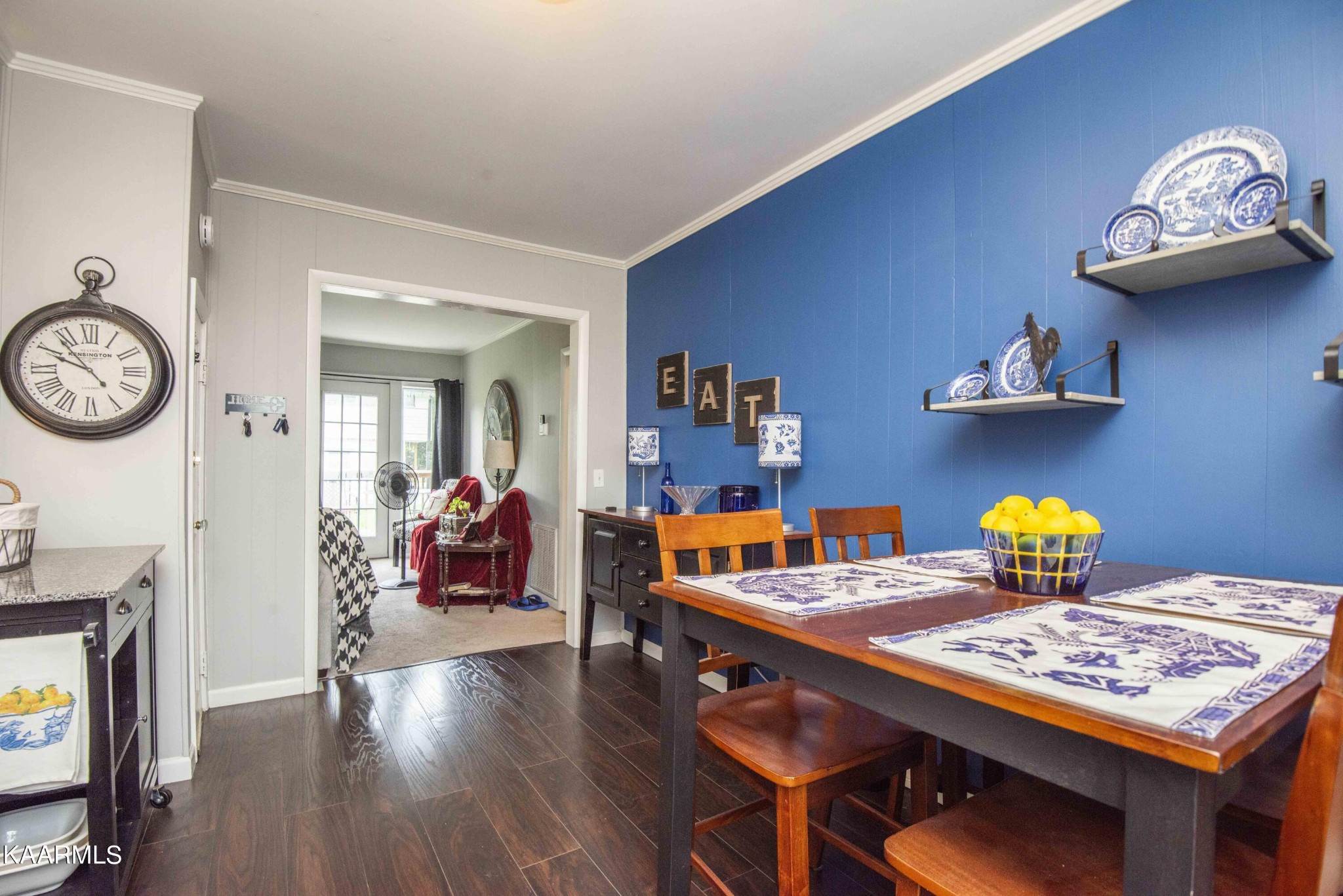 425 Clifton Road Northwest Knoxville, TN 37921 - Photo 10 of 38 a view of a dining room with furniture and wooden floor