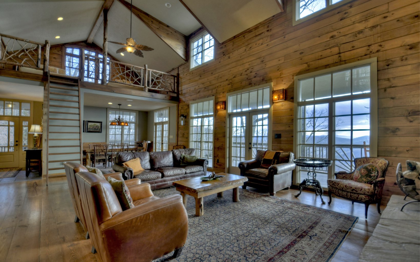 773 Heards Ridge Morganton, GA 30560 - Photo 12 of 54 a living room with furniture fireplace and a chandelier