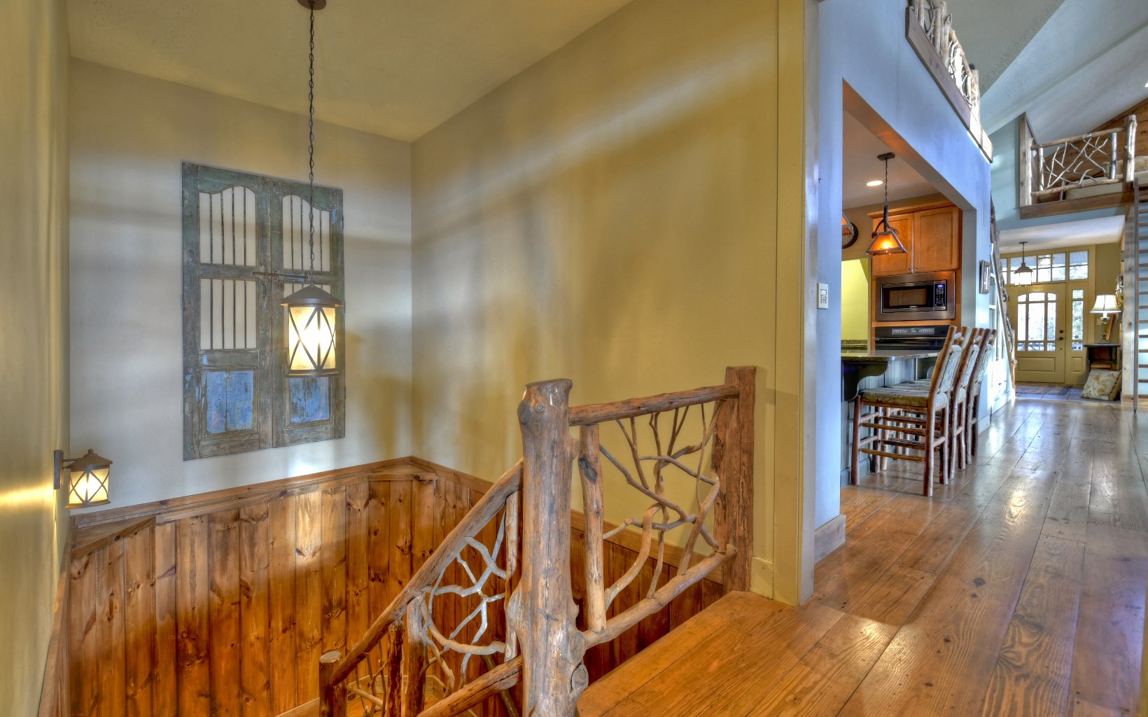 773 Heards Ridge Morganton, GA 30560 - Photo 43 of 54 a view of a hallway with wooden floor and staircase