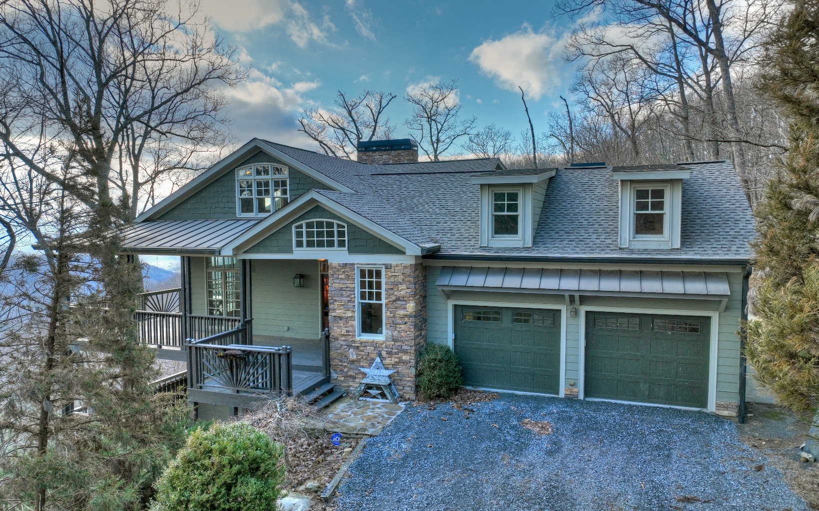 773 Heards Ridge Morganton, GA 30560 - Photo 50 of 54 a front view of a house with plants and garden