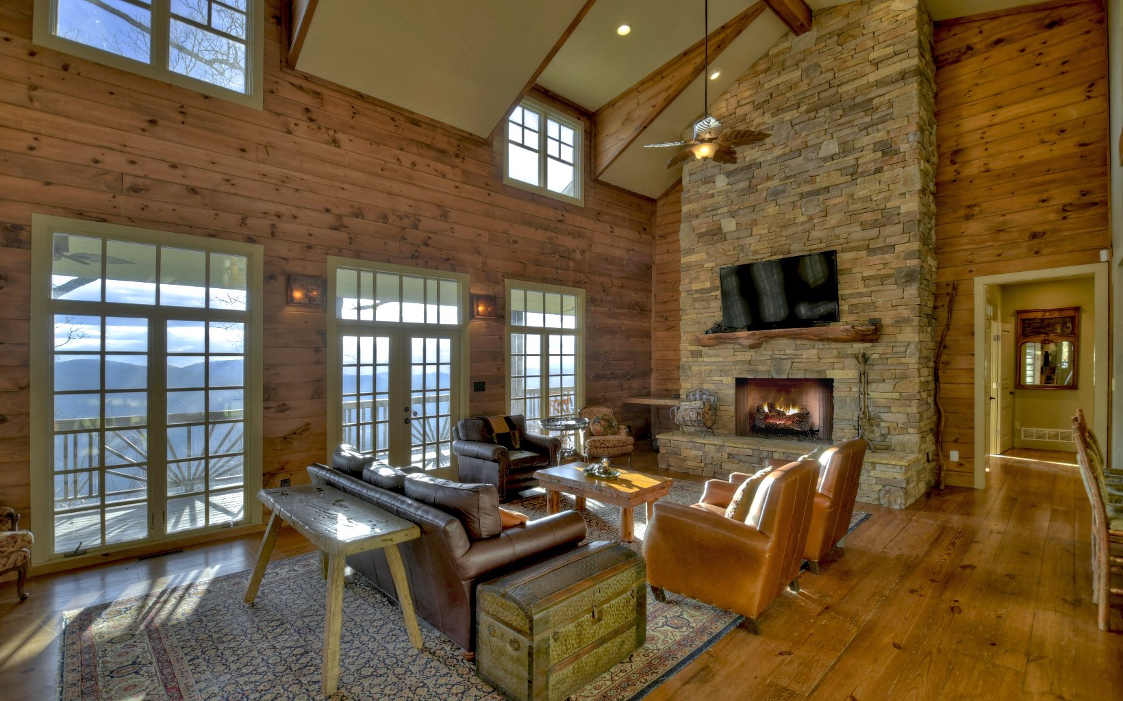 773 Heards Ridge Morganton, GA 30560 - Photo 6 of 54 a living room with fireplace furniture and a flat screen tv
