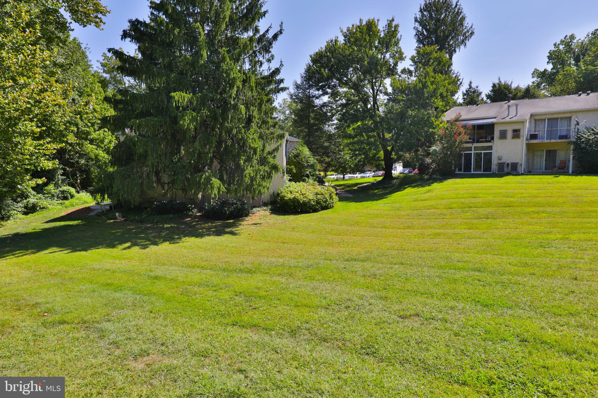 7300 Cresheim Road, Unit C13 Philadelphia, PA 19119 - Photo 23 of 26 a view of a house with a yard