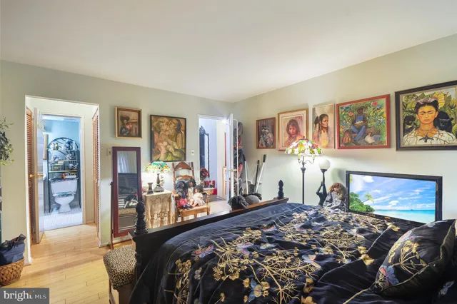 a bed room with a bed and a couch