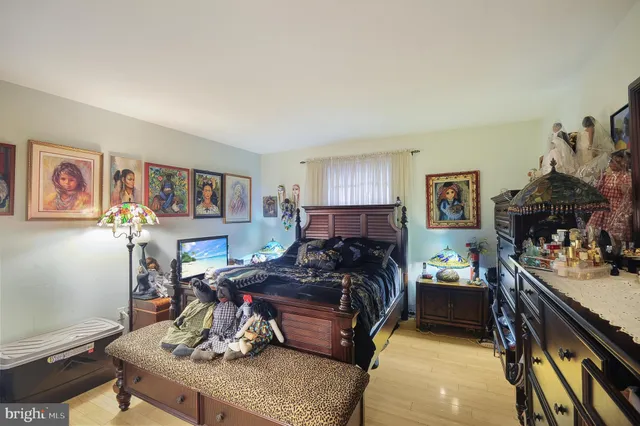 a bedroom with furniture and a bed