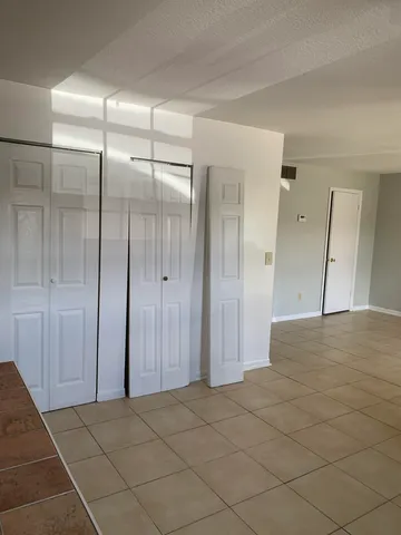 en empty room with windows