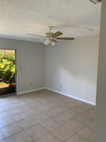 an empty room with a bench