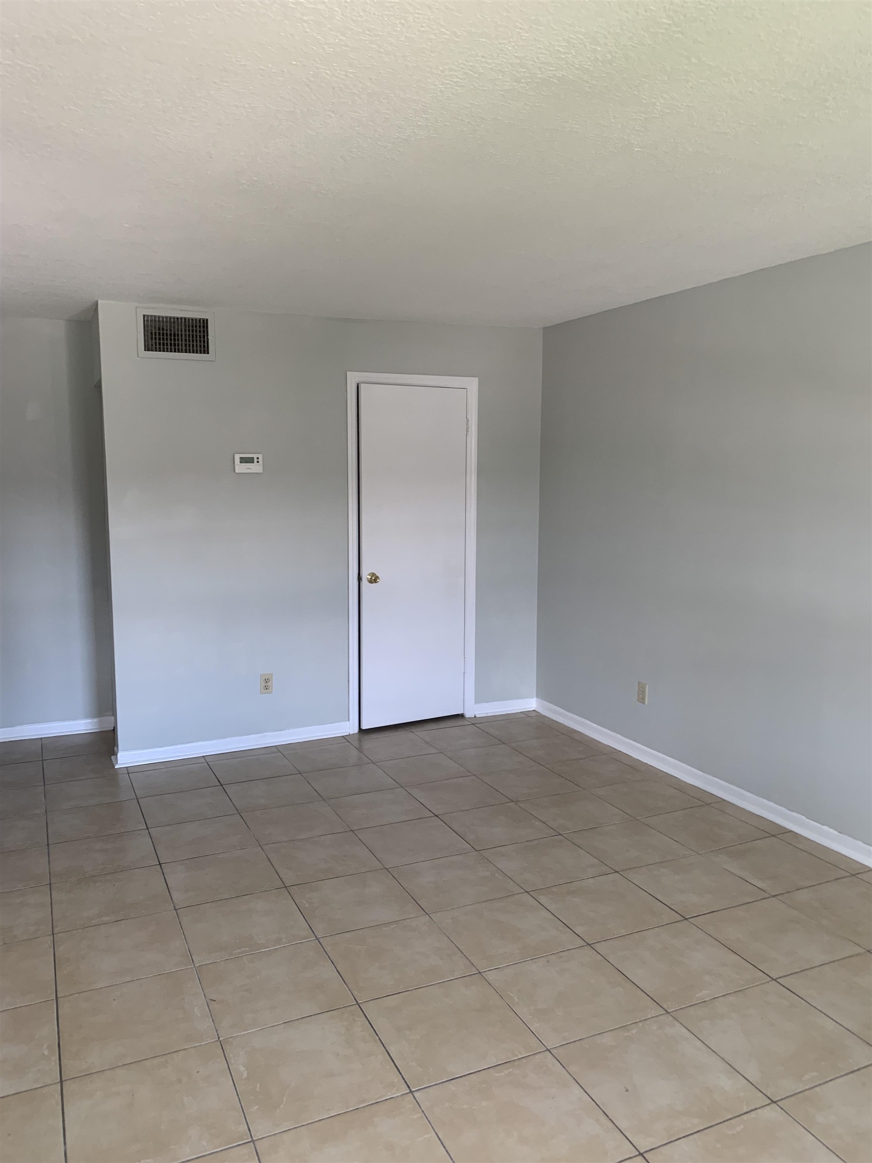 1845 Old Moultrie Road, Unit 30 St. Augustine, FL 32084 - Photo 15 of 15 an empty room with a bench