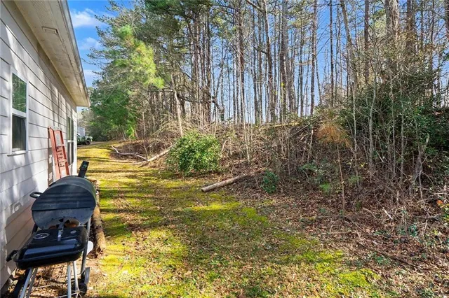 a view of yard with seating space