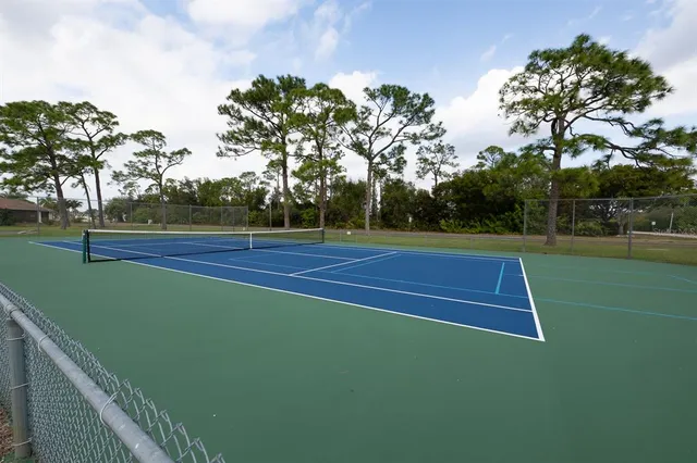 a view of swimming pool with a yard