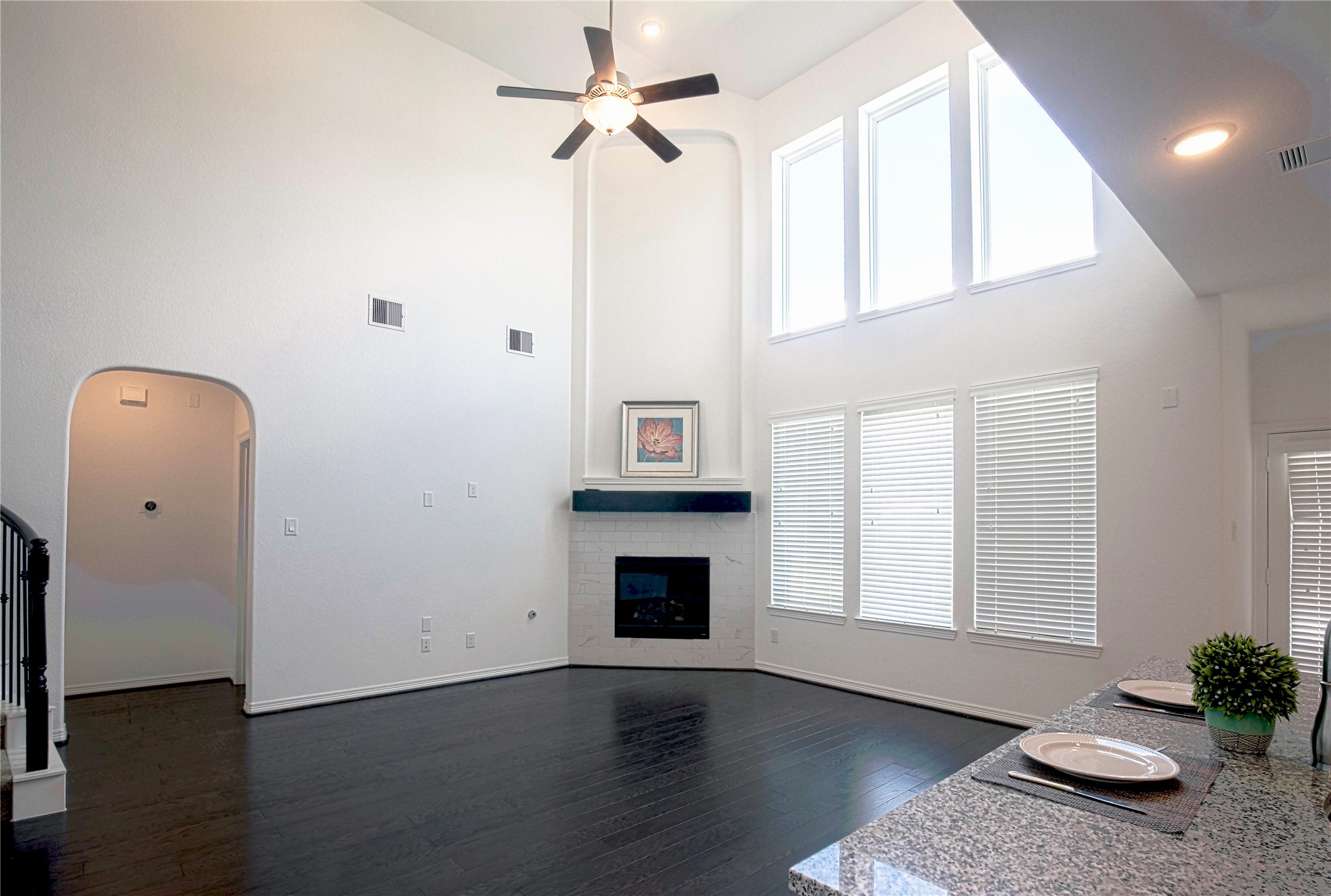 6307 Grand Drift Court Katy, TX 77494 - Photo 5 of 24 Den with high ceiling, lots of window, fireplace, and hardwood floor.