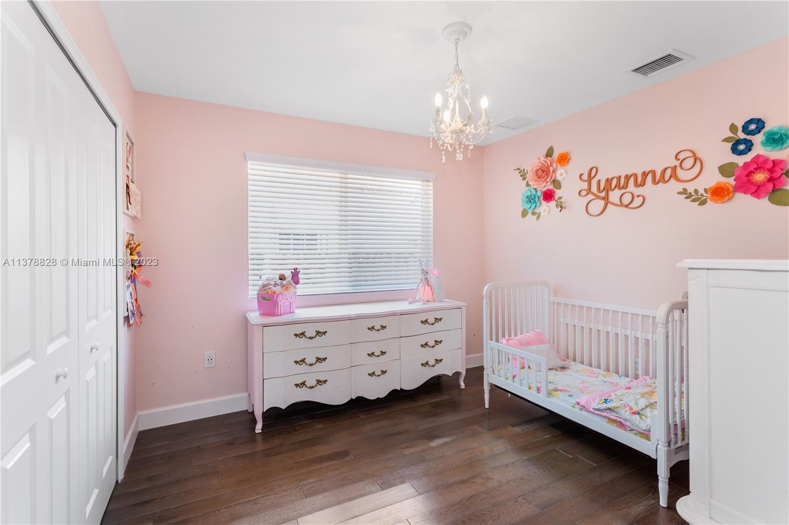 3371 Southwest 21st Street Miami, FL 33145 - Photo 11 of 23 a bedroom with a bed and a window