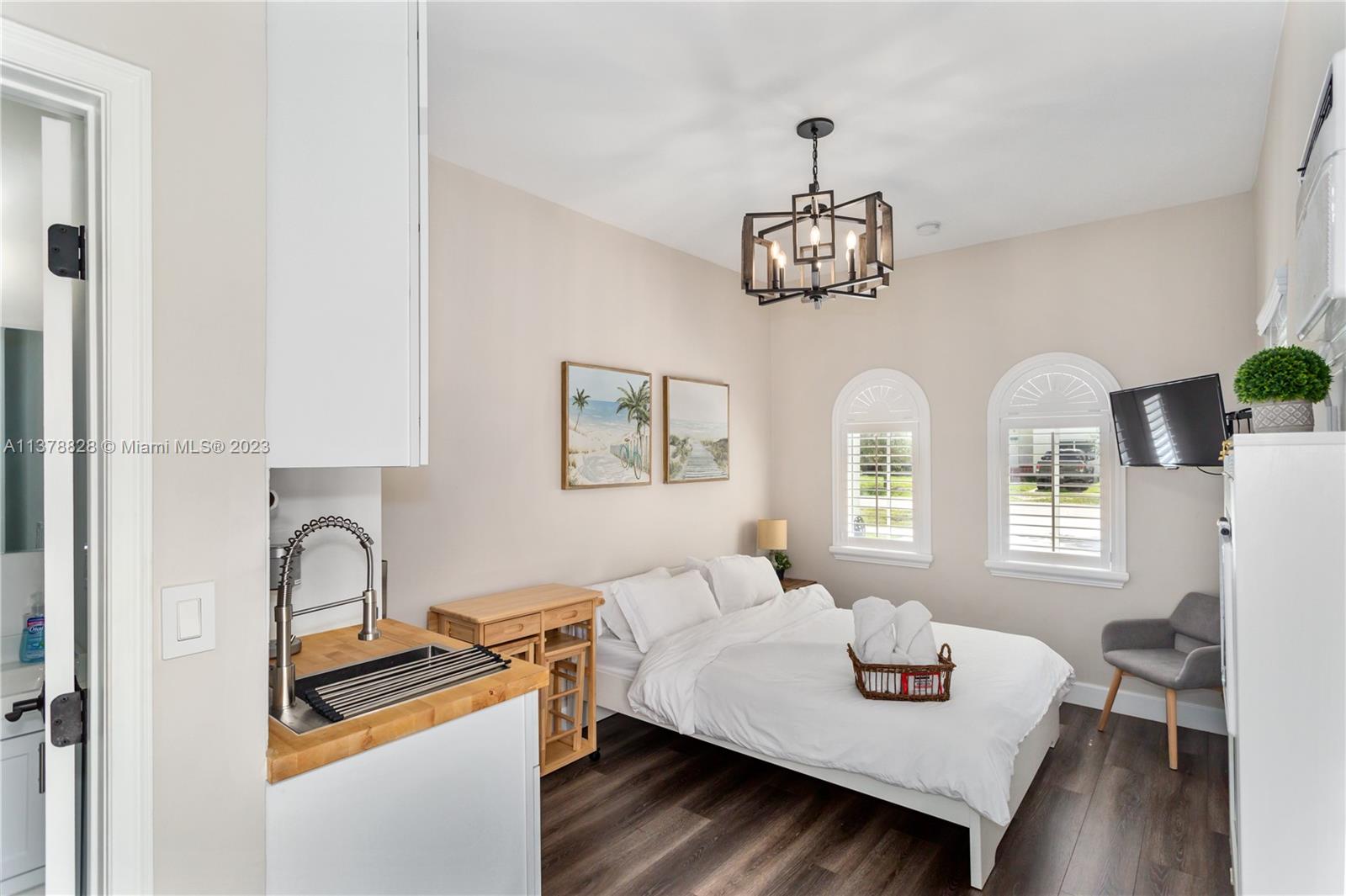 3371 Southwest 21st Street Miami, FL 33145 - Photo 12 of 23 a living room with furniture chandelier and window