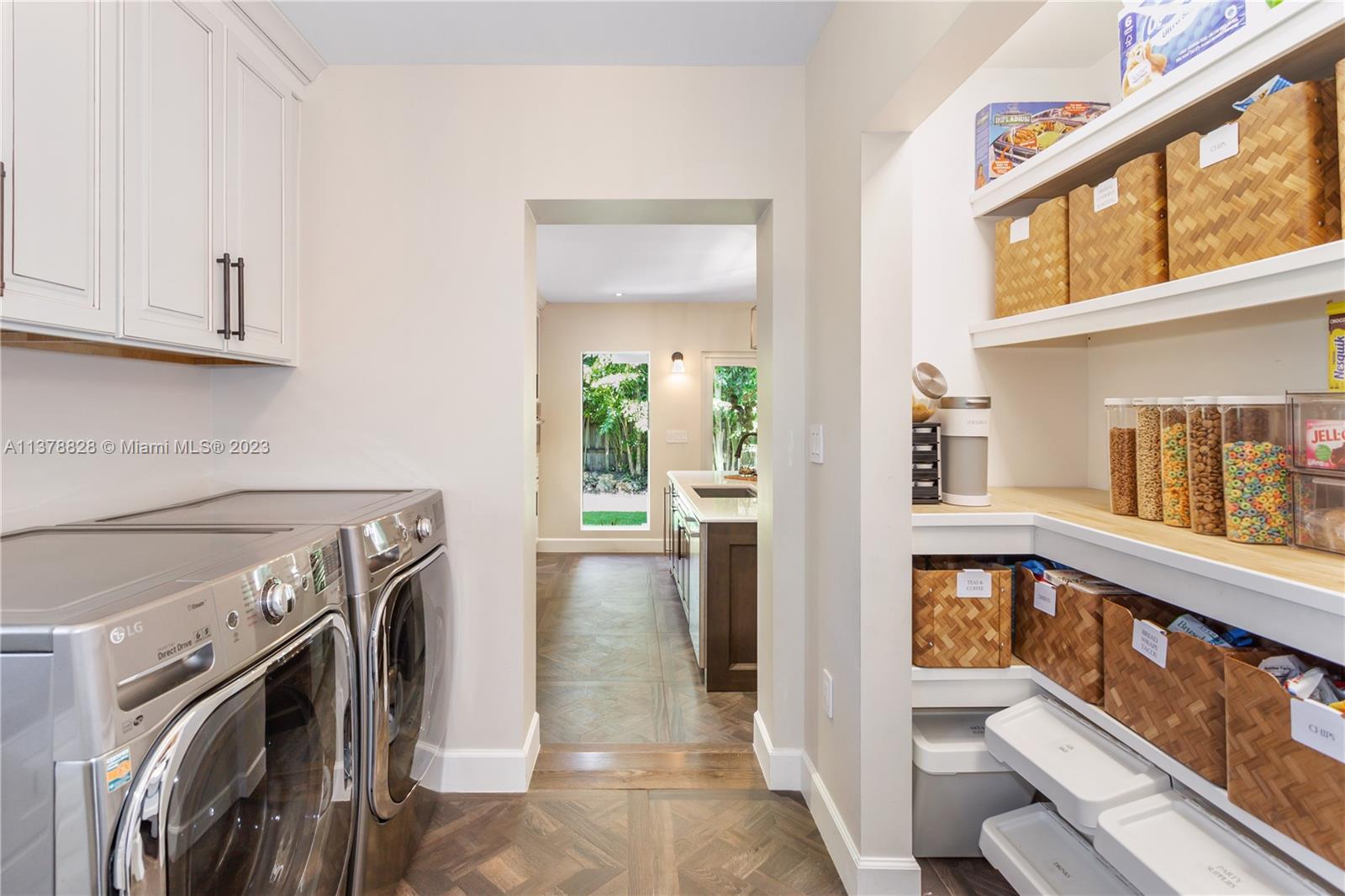 3371 Southwest 21st Street Miami, FL 33145 - Photo 17 of 23 a view of a hallway with washer and dryer
