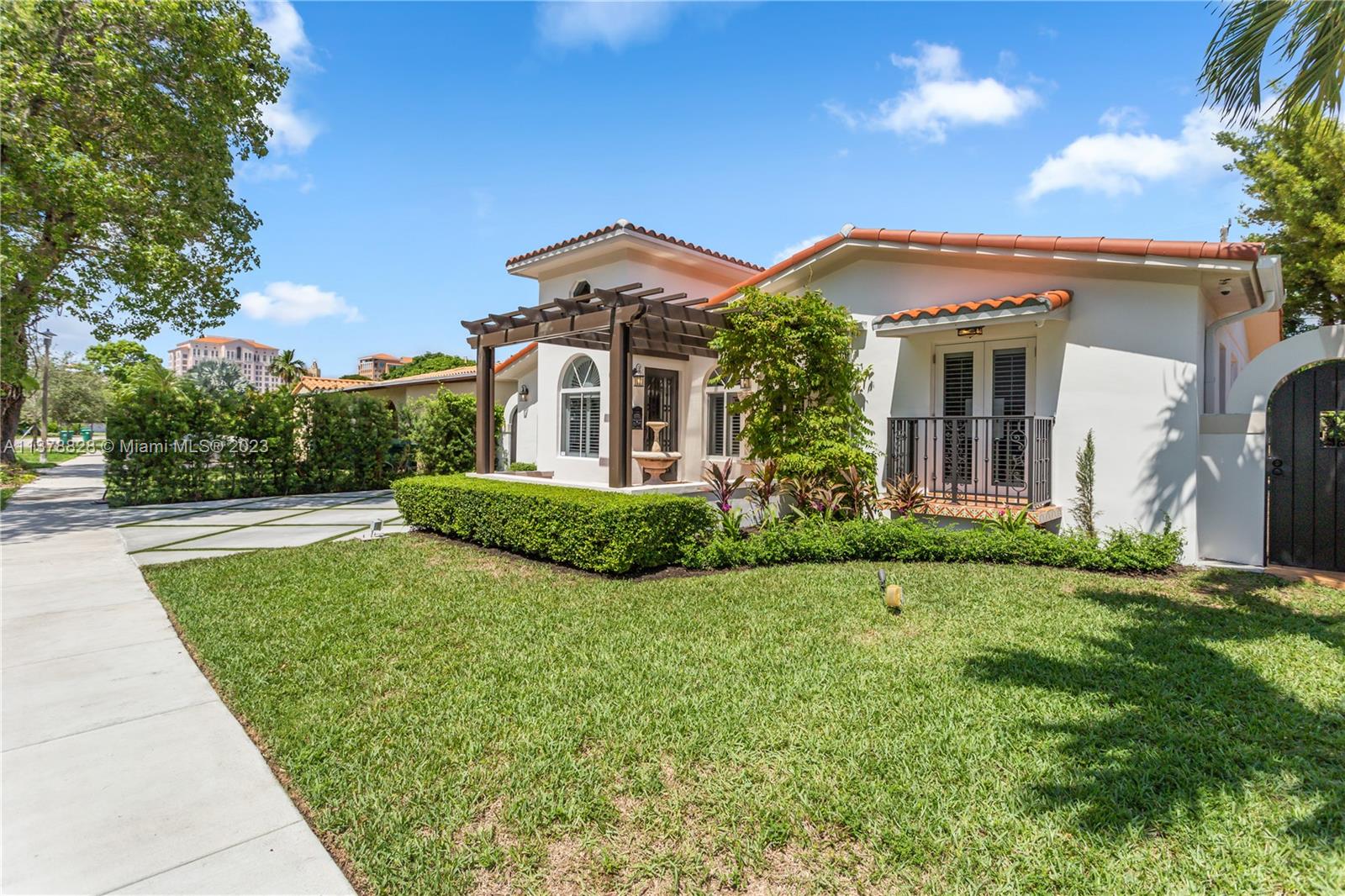 3371 Southwest 21st Street Miami, FL 33145 - Photo 23 of 23 a front view of a house with garden