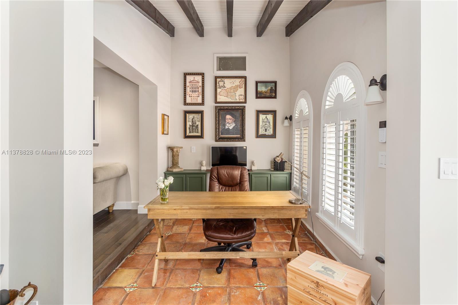 3371 Southwest 21st Street Miami, FL 33145 - Photo 3 of 23 a living room with furniture and a fireplace