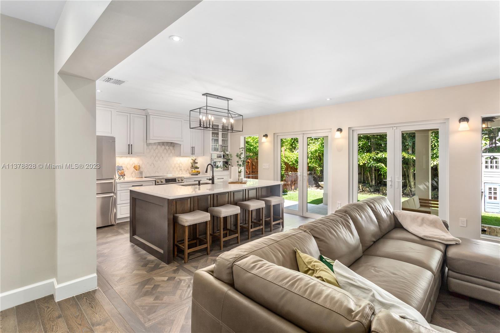 3371 Southwest 21st Street Miami, FL 33145 - Photo 6 of 23 a living room with furniture and a large window