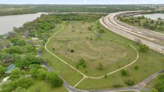 a view of a swimming pool with a lake view
