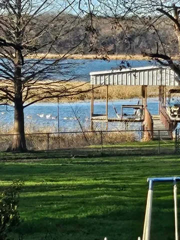 a view of a swimming pool with a garden