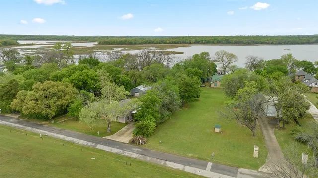a view of an ocean and a yard